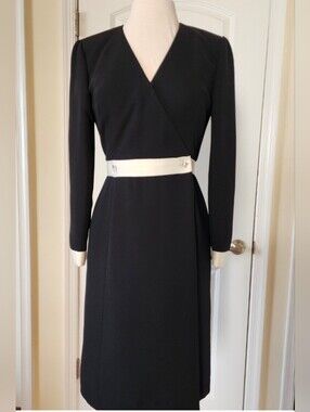 Elegant Black Long-Sleeve Wrap Midi Dress with White Waist Accents